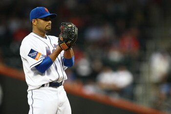 NEW YORK - JUNE 09:  Johan Santana #57 of the New York Mets waits to pitch against the Philadelphia Phillies during their game at Citi Field on June 9, 2009 in the Flushing neighborhood of the Queens borough of New York City.  (Photo by Chris McGrath/Gett