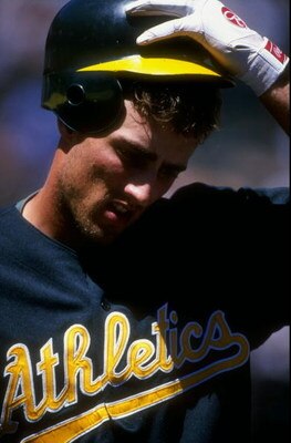 14 Jul 1998:  Outfielder Ben Grieve #14 of the Oakland Athletics takes a break during a game against the Anaheim Angels at the Oakland Coliseum in Oakland, California.  The Athletics defeated the Angels 6-2. Mandatory Credit: Otto Greule Jr.  /Allsport