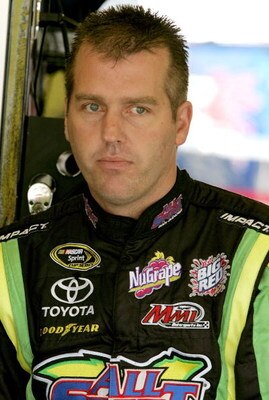 DARLINGTON, SC - MAY 08: Jeremy Mayfield, driver of the #41 SmallSponsor.com Toyota, stands in the garage during practice for the NASCAR Sprint Cup Series Southern 500 on May 8, 2009 at Darlington Raceway in Darlington, South Carolina.  (Photo by Jerry Ma