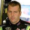 DARLINGTON, SC - MAY 08: Jeremy Mayfield, driver of the #41 SmallSponsor.com Toyota, stands in the garage during practice for the NASCAR Sprint Cup Series Southern 500 on May 8, 2009 at Darlington Raceway in Darlington, South Carolina.  (Photo by Jerry Ma