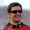 DAYTONA BEACH, FL - JULY 04: Martin Truex Jr, driver of the #1 Bass Pro Shops/Tracker Boats Chevrolet, stands on the grid prior to the NASCAR Sprint Cup Series 51st Annual Coke Zero 400 at Daytona International Speedway on July 4, 2009 in Daytona Beach, F