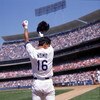 30 Jul 1995: Pitcher Hideo Nomo of the Los Angeles Dodgers wipes the sweat from his forehead while standing in the on deck circle waiting for his at-bat during the Dodgers 5-4 victory over the Cincinnati Reds at Dodger Stadium in Los Angeles, California.