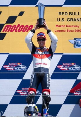 MONTEREY, CA - JULY 5:  Dani Pedrosa of Spain rider of the #3 Repsol Honda celebrates after winning the Moto GP Red Bull U. S. Grand Prix at the Mazda Raceway Laguna Seca on July 5, 2009 in Monterey, California.  (Photo by Robert Laberge/Getty Images)