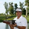 SILVIS, IL - JULY 13:  Kenny Perry poses with the trophy after winning the 2008 John Deere Classic at TPC at Deere Run on Sunday, July 13, 2008 in Silvis, Illinois.  (Photo by Kevin C. Cox/Getty Images)