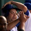KANSAS CITY, MO - JULY 7:  David DeJesus #9 of the Kansas City Royals is congratulated by teammates in the dugout after scoring during the bottom of the 8th inning of the game against the Tampa Bay Devil Rays at Kaufmann Stadium July 7, 2007 in Kansas Cit