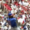 ST. LOUIS - JULY 10:  Sammy Sosa #21 of the Chicago Cubs swings at the pitch during the game against the St. Louis Cardinals on July 10, 2004 at Busch Stadium in St. Louis, Missouri.  The Cardinals won 5-2.  (Photo by Elsa/Getty Images) 