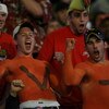 MIAMI - JANUARY 01: Virgina Tech fans celebrate during the FedEx Orange Bowl against the Cincinnati Bearcats at Dolphin Stadium on January 1, 2009 in Miami, Florida.  (Photo by Marc Serota/Getty Images)