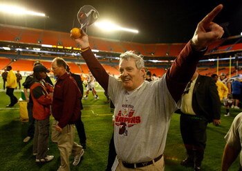 MIAMI - JANUARY 01:  Head coach Frank Beamer of the Virginia Tech Hokies celebrates after defeating the Cincinnati Bearcats to win the FedEx Orange Bowl at Dolphin Stadium on January 1, 2009 in Miami, Florida.  (Photo by Streeter Lecka/Getty Images)