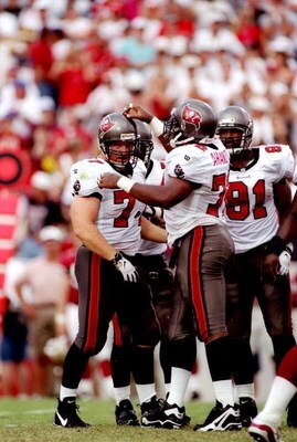 31 Aug 1997:  Defensive linemen Brad Culpepper (let) and Chidi Ahanotu of the Tampa Bay Buccaneers celebrate during a game against the San Francisco 49ers at Houlihan''s Stadium in Tampa, Florida.  The Buccaneers won the game, 13-6. Mandatory Credit: Scot