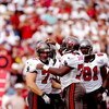 31 Aug 1997:  Defensive linemen Brad Culpepper (let) and Chidi Ahanotu of the Tampa Bay Buccaneers celebrate during a game against the San Francisco 49ers at Houlihan''s Stadium in Tampa, Florida.  The Buccaneers won the game, 13-6. Mandatory Credit: Scot