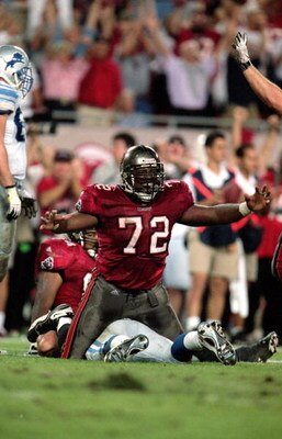 12 Dec 1999: Chidi Ahanotu #72 of the Tampa Bay Buccaneers celebrates after his tackle during the game against the Detroit Lions at the Raymond James Stadium in Tampa Bay, Florida. The Buccaneers defeated the Lions 23-16. Mandatory Credit: Andy Lyons  /Al