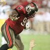 12 Nov 2000:  Warren Sapp # 99 of the Tampa Bay Buccaneers taunts Matt Hassselbeck # 11 of the Green Bay Packers after getting a pass off in the fourth quarter at Raymond James Stadium in Tampa, Florida. Mandatory Credit: Eliot Schechter/ALLSPORT