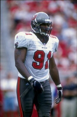 20 Sep 1998:  Defensive end Regan Upshaw #91 of the Tampa Bay Buccaneers in action during the game against the Chicago Bears at the Raymond James Stadium in Tampa, Florida. The Buccaneers defeated the Bears 27-15. Mandatory Credit: Scott Halleran  /Allspo