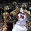 AUBURN HILLS, MI - APRIL 26: Rasheed Wallace #32 of the Detroit Pistons battles for a rebound with Joe Smith #32 of the Cleveland Cavaliers in Game Four of the Eastern Conference Quarterfinals during the 2009 NBA Playoffs at the Palace of Auburn Hills on 