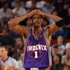 SEATTLE - OCTOBER 30:  Anfernee Hardaway #1 of the Phoenix Suns reacts during the game against the Seattle Sonics at Key Arena on October 30, 2002 in Seattle, Washington.  The Sonics won 86-73.  NOTE TO USER: User expressly acknowledges and agrees that, b