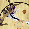 SAN ANTONIO - MAY 25:  Manu Ginobili #20 of the San Antonio Spurs goes up for a shot as he is fouled by Derek Fisher #2 of the Los Angeles Lakers in Game Three of the Western Conference Finals during the 2008 NBA Playoffs on May 25, 2008 at the AT&T Cente