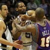 SAN ANTONIO - MAY 14:  Forward Robert Horry #5 of the San Antonio Spurs pushes with Raja Bell #19 after receiving a flagrant foul on Steve Nash in Game Four of the Western Conference Semifinals during the 2007 NBA Playoffs on May 14, 2007 at AT&T Center i