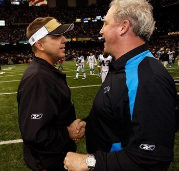 NEW ORLEANS - DECEMBER 28:  Head coach John Fox of the Carolina Panthers is congratulated by head coach Sean Payton of the New Orleans Saints on December 28, 2008 at the Superdome in New Orleans, Louisiana. The Panthers defated the Saints 33-31.  (Photo b