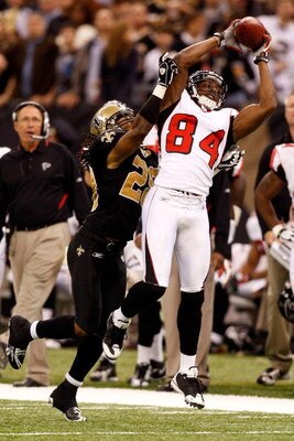 NEW ORLEANS - DECEMBER 07:  Roddy White #84 of the Atlanta Falcons makes a catch over Usama Young #28 of the New Orleans Saints on December 7, 2008 at the Superdome in New Orleans, Louisiana.  (Photo by Chris Graythen/Getty Images)