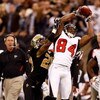NEW ORLEANS - DECEMBER 07:  Roddy White #84 of the Atlanta Falcons makes a catch over Usama Young #28 of the New Orleans Saints on December 7, 2008 at the Superdome in New Orleans, Louisiana.  (Photo by Chris Graythen/Getty Images)