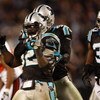 CHARLOTTE, NC - DECEMBER 08:  Jon Beason #52 of the Carolina Panthers reacts to making a stop on defense against the Tampa Bay Buccaneers at Bank of America Stadium on December 8, 2008 in Charlotte, North Carolina  (Photo by Streeter Lecka/Getty Images)