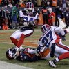 DENVER - DECEMBER 21:  Wide receiver Brandon Stokley #14 of the Denver Broncos was unable to make a reception on the Broncos final offensive play of the game as Reggie Corner #27 of the Buffalo Bills provided coverage on the play and Terrence McGee #24 co