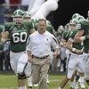 ORLANDO, FL - JANUARY 1: Coach Mark Dantonio of the Michigan State Spartans leads the team to the field for play against the Georgia Bulldogs at the 2009 Capital One Bowl at the Citrus Bowl on January 1, 2009 in Orlando, Florida.  (Photo by Al Messerschmi