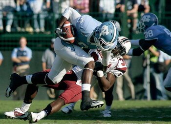 CHAPEL HILL, NC - OCTOBER 13:  Darian Stewart #32 of the South Carolina Gamecocks tackles Greg Little #8 of the North Carolina Tar Heels in the second quarter at Kenan Stadium October 13, 2007 in Chapel Hill, North Carolina.  (Photo by Grant Halverson/Get