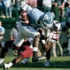 CHAPEL HILL, NC - OCTOBER 13:  Darian Stewart #32 of the South Carolina Gamecocks tackles Greg Little #8 of the North Carolina Tar Heels in the second quarter at Kenan Stadium October 13, 2007 in Chapel Hill, North Carolina.  (Photo by Grant Halverson/Get