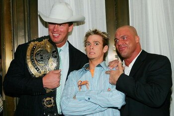 NEW YORK - MARCH 6:  Singer Aaron Carter (C) poses with WWE wrestlers John Bradshaw Layfield (L) and Kurt Angle (R) at the 6th Annual T.J. Martell 'Family' Day' Indoor Carnival Benefit at Cipriani's Fifth Avenue March 6, 2005 in New York City. (Photo by E
