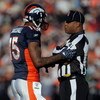 DENVER - NOVEMBER 23:  Wide receiver Brandon Marshall #15 of the Denver Broncos chats with field judge Boris Cheek as the Broncos face the Oakland Raiders during week 12 NFL action at Invesco Field at Mile High on November 23, 2008 in Denver, Colorado. Th