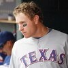 DETROIT - APRIL 10:  Josh Hamilton #32 of the Texas Rangers looks on from the dugout against the Detroit Tigers during Opening Day on April 10, 2009 at Comerica Park in Detroit, Michigan. Detroit won the game 15-2. (Photo by Gregory Shamus/Getty Images)