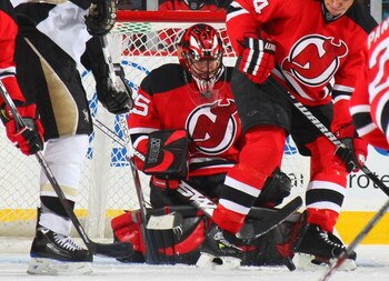NEWARK, NJ - DECEMBER 10: Scott Clemmensen #35 of the New Jersey Devils searches for the puck during action against the Pittsburgh Penguins on December 10, 2008 at the Prudential Center in Newark, New Jersey. (Photo by Bruce Bennett/Getty Images)