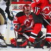 NEWARK, NJ - DECEMBER 10: Scott Clemmensen #35 of the New Jersey Devils searches for the puck during action against the Pittsburgh Penguins on December 10, 2008 at the Prudential Center in Newark, New Jersey. (Photo by Bruce Bennett/Getty Images)