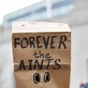 CHICAGO - JANUARY 21: A fan with a paper bag on his head with the words 'Forever the Aints Bear Down' on it stands outside before the NFC Championship Game between the New Orleans Saints and the Chicago Bears on January 21, 2007 at Soldier Field in Chicag