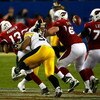TAMPA, FL - FEBRUARY 01:  Quarterback Kurt Warner #13 of the Arizona Cardinals fumbles the ball with :15 seconds to play as he is sacked by LaMarr Woodley #56 of the Pittsburgh Steelers during Super Bowl XLIII on February 1, 2009 at Raymond James Stadium 