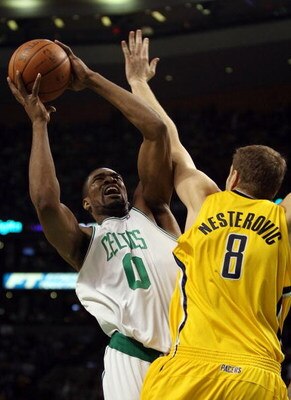 BOSTON - FEBRUARY 27:  Leon Powe #0 of the Boston Celtics takes a shot as Rasho Nesterovic #8 of the Indiana Pacers defends on February 27, 2009 at TD Banknorth Garden in Boston, Massachusetts. NOTE TO USER: User expressly acknowledges and agrees that, by