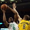 BOSTON - FEBRUARY 27:  Leon Powe #0 of the Boston Celtics takes a shot as Rasho Nesterovic #8 of the Indiana Pacers defends on February 27, 2009 at TD Banknorth Garden in Boston, Massachusetts. NOTE TO USER: User expressly acknowledges and agrees that, by