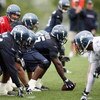 RENTON, WA - MAY 2:  Center Chris Spencer #65 prepares to snap the ball to Matt Hasselbeck #8 of the Seattle Seahawks during minicamp at the Seahawks training facility on May 2, 2009 in Renton, Washington. (Photo by Otto Greule Jr/Getty Images) 