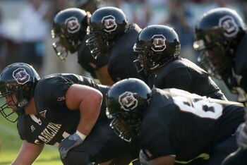 COLUMBIA, SC - SEPTEMBER 11:  The offensive line of the South Carolina Gamecocks readies for the snap of the ball against the Georgia Bulldogs during their game at Williams-Brice Stadium on September 11, 2004 in Columbia, South Carolina. Georgia defeated 