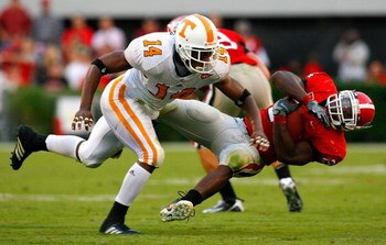 ATHENS, GA - OCTOBER 11:  Eric Berry #14 of the Tennessee Volunteers tackles Knowshon Moreno #24 of the Georgia Bulldogs during the game at Sanford Stadium on October 11, 2008 in Athens, Georgia.  (Photo by Kevin C. Cox/Getty Images)