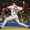 NEW YORK - APRIL 23:  Derek Lowe #32 of the Boston Red Sox pitches against the New York Yankees during their game on April 23, 2004 at Yankee Stadium in the Bronx borough of New York City.  (Photo by Al Bello/Getty Images)
