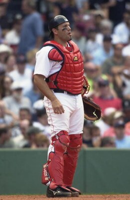 BOSTON - JUNE 24:  Doug Mirabelli #28 of the Boston Red Sox looks on during the game against the Minnesota Twins on June 24, 2004 at Fenway Park in Boston, Massachusetts. The Twins won the game 4 -3 in the tenth inning. (Photo by Darren McCollester/Getty 