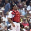 BOSTON - JUNE 24:  Doug Mirabelli #28 of the Boston Red Sox looks on during the game against the Minnesota Twins on June 24, 2004 at Fenway Park in Boston, Massachusetts. The Twins won the game 4 -3 in the tenth inning. (Photo by Darren McCollester/Getty 