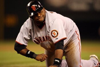 SEATTLE - MAY 22:  Pablo Sandoval #48 of the San Francisco Giants looks on from his knees after a slide during the game against the Seattle Mariners on May 22, 2009 in Seattle, Washington. The Mariners defeated the Giants 2-1 in twelve innings. (Photo by 