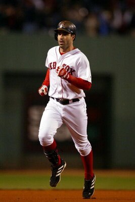 BOSTON - OCTOBER 13:  Todd Walker #12 of the Boston Red Sox rounds the bases after hitting a home run in the bottom of the fourth inning of Game 4  of the 2003 American League Championship Series against the New York Yankees October 13, 2003 at Fenway Par
