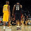 LOS ANGELES, CA - JANUARY 19:  Kobe Bryant #24 of the Los Angeles Lakers walks next to LeBron James #23 of the Cleveland Cavaliers during a break from the game at Staples Center on January 19, 2009 in Los Angeles, California.  (Photo by Harry How/Getty Im