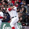 BOSTON - APRIL 11:  Kevin Millar #15 of the Boston Red Sox hits a two run base hit in the third inning against Mike Mussina of the New York Yankees scoring Trot Nixon and Manny Ramirez giving Boston a 4-0 lead during thier game at Fenway Park on April 11,