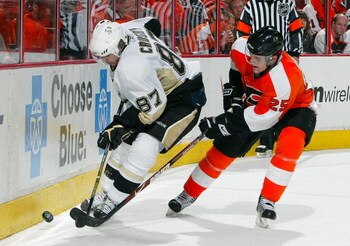 PHILADELPHIA - APRIL 25: Sidney Crosby #87 of the Pittsburgh Penguins skates against Matt Carle #25 of the Philadelphia Flyers during Game Six of the Eastern Conference Quarterfinal Round of the 2009 NHL Stanley Cup Playoffs at the Wachovia Center on Apri