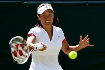 WIMBLEDON, ENGLAND - JUNE 23:  Kimiko Date Krumm of Japan plays a forehand during the women's singles first round match against Caroline Wozniacki of Denmark on Day Two of the Wimbledon Lawn Tennis Championships at the All England Lawn Tennis and Croquet 